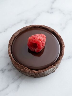 Gemini_Generated_Image_tjx42mtjx42mtjx4 (1) Tartelette Chocolat / Framboise